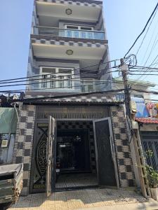 Nhà mặt tiền 4 Tầng Tân Quy Q7