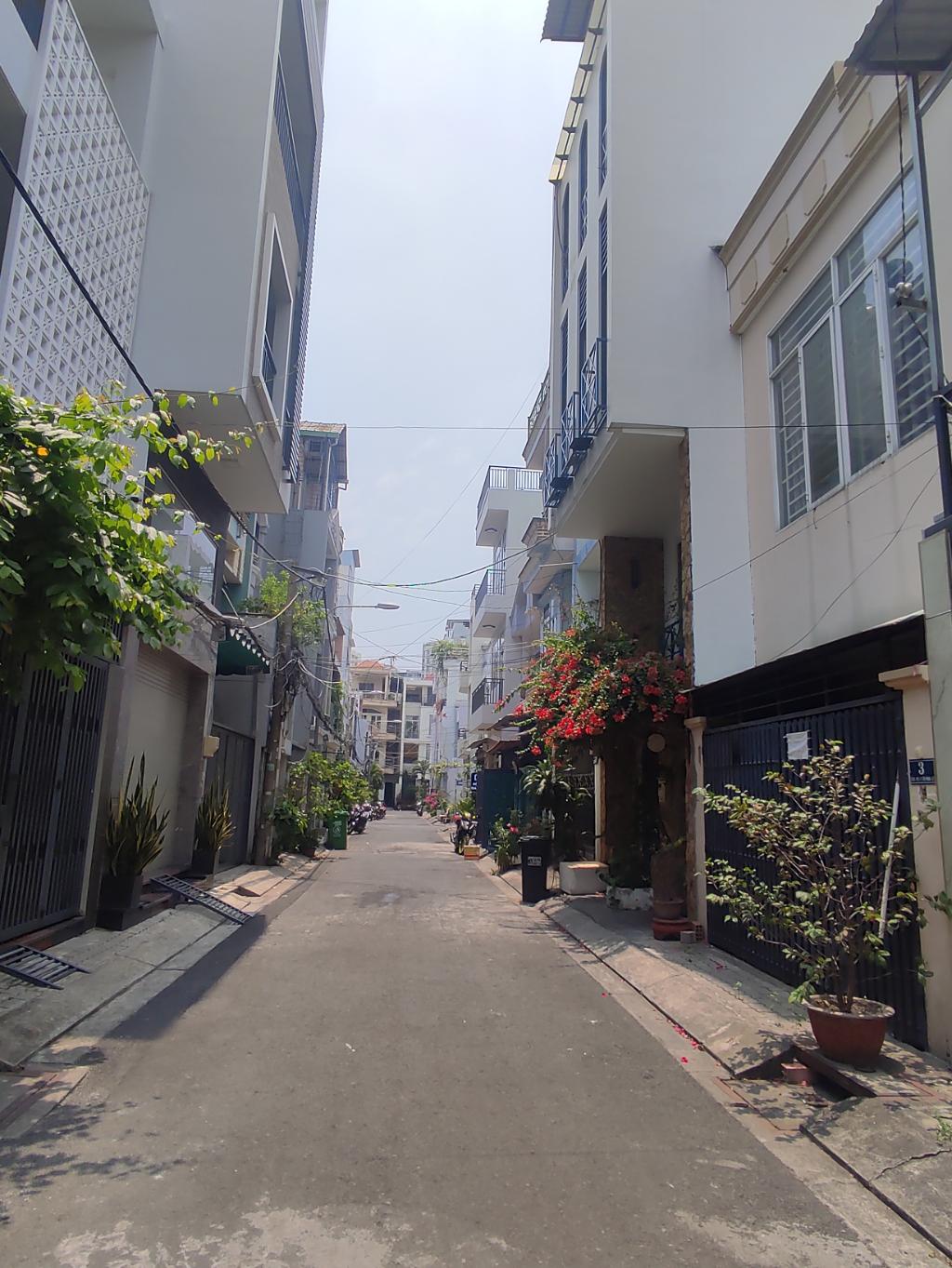 QUẬN 7 - BÁN CHDV - 9 PHÒNG - HẦM - THANG MÁY - HXH - DÀI 15M - 13.x TỶ
