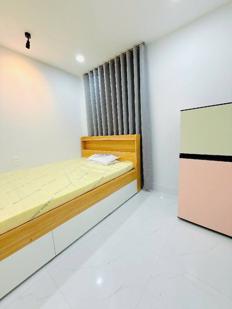 Quận 8 nhà mặt tiền dài 40m, sẵn 15 phòng chdv cho thuê, có hầm xe, thang máy, 3x tỷ