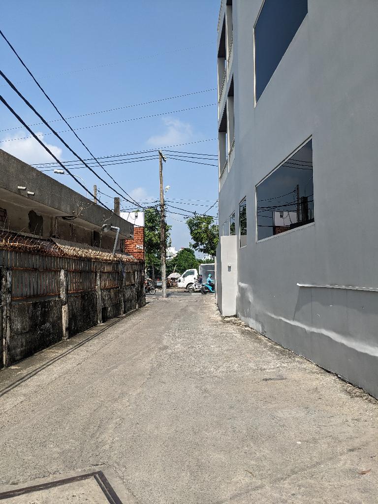 bán nhà Trần Xuân Soạn (xe hơi đậu cửa); 4,2x17m; thu nhập 9tr/tháng; sổ hồng; 5,5 tỷ