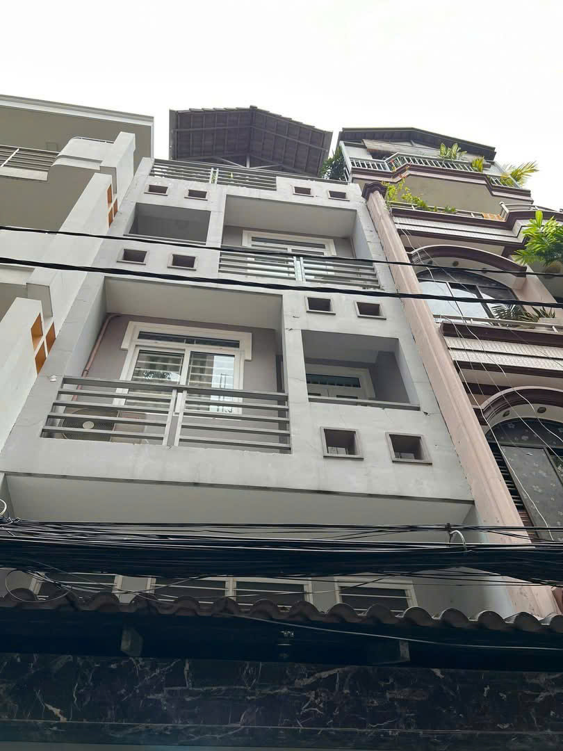 bán nhà gấp quận 11 nhà 4 tầng, sổ vuông, hẻm ô tô