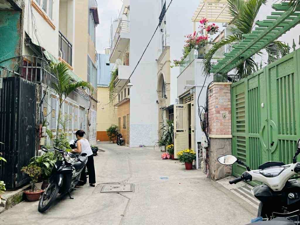 BÁN NHÀ HẺM XE HƠI GẦN MẶT TIỀN ĐƯỜNG LÊ VĂN SỸ - CÓ DÒNG TIỀN CHO THUÊ - GIÁ 5.X TỶ.