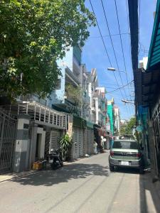 BÁN NHÀ HXH GẦN CMT8, TÂN BÌNH, XE HƠI NGỦ TRONG NHÀ, 4 TẦNG GIÁ 9.X TỶ.