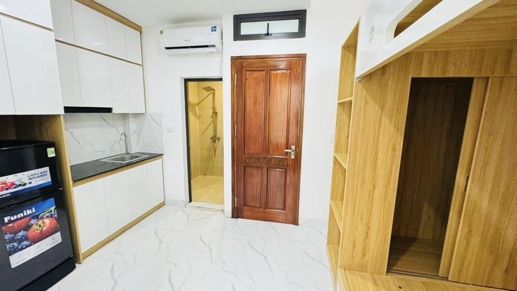 BÁN CCMN Trần Thái Tông-thủ phủ sinh viên-thang máy-11 phòng khép kín dòng tiền 65tr/tháng