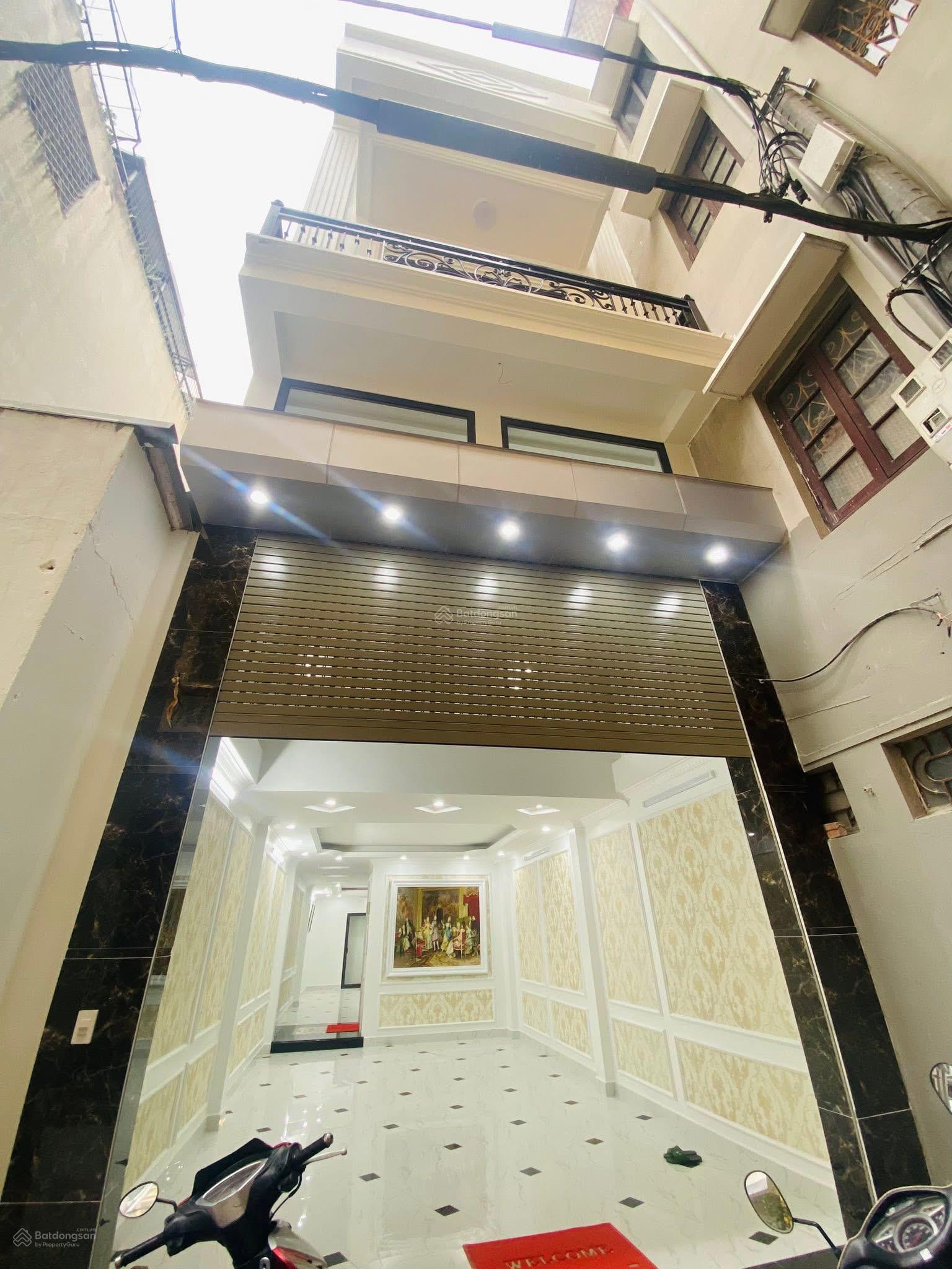 Bán nhà phân lô 3 bước ra hồ Linh Đàm 77m2, 5 tầng, thang máy chỉ 15.5 tỷ, gara 2 oto