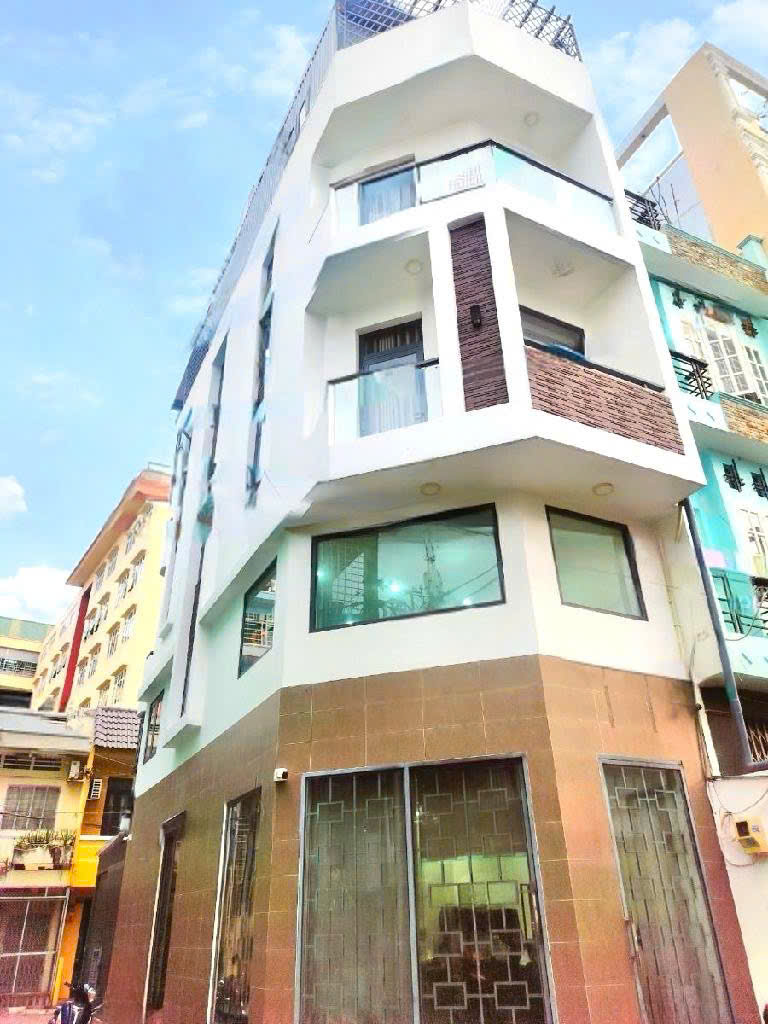 Nhà 5 tầng thoáng 3 mặt hẻm xe tải - Trịnh Đình Trọng