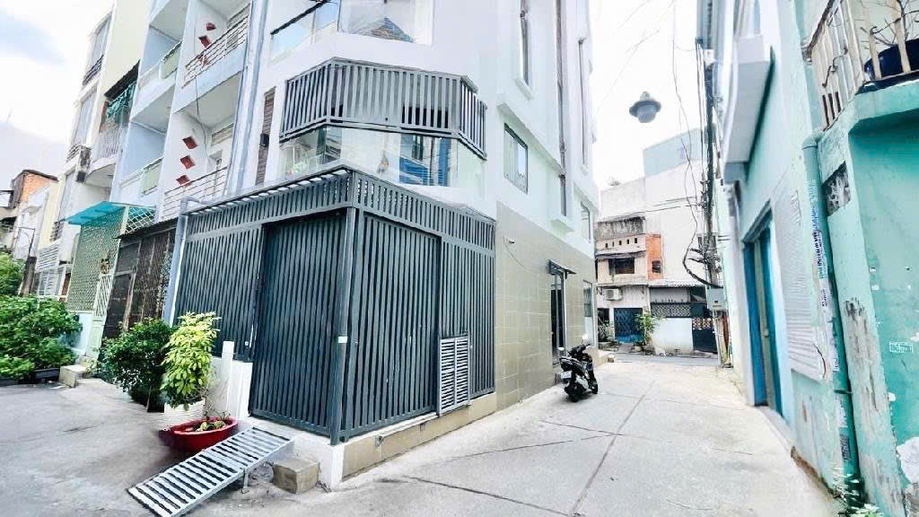 Nhà 5 tầng thoáng 3 mặt hẻm xe tải - Trịnh Đình Trọng