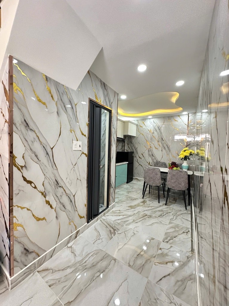 Nhà đẹp 4 tầng - hẻm xe hơi đỗ - quận 5 giáp quận 1