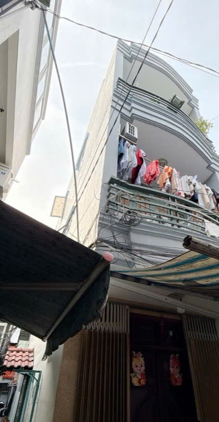 BÁN NHÀ 4 MẶT TIỀN HẺM - KHÔNG LỘ GIỚI Nguyễn Thị Thập, Phường Tân Phong, Quận 7.