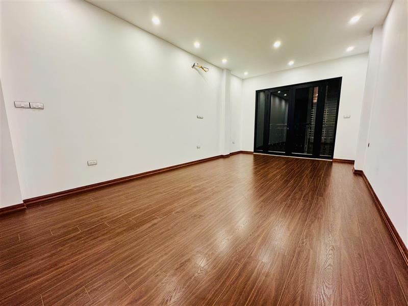 HÀO NAM - MẶT NGÕ Ô TÔ THÔNG NHÀ MỚI 50M2 , 7 TẦNG THANG MÁY -GARA Ô TÔ